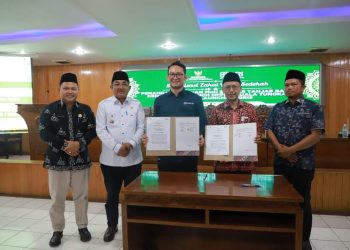 Bupati Tanjabbbar Resmikan QRIS Bersama BAZNAS dan BRI