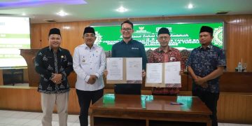 Bupati Tanjabbbar Resmikan QRIS Bersama BAZNAS dan BRI